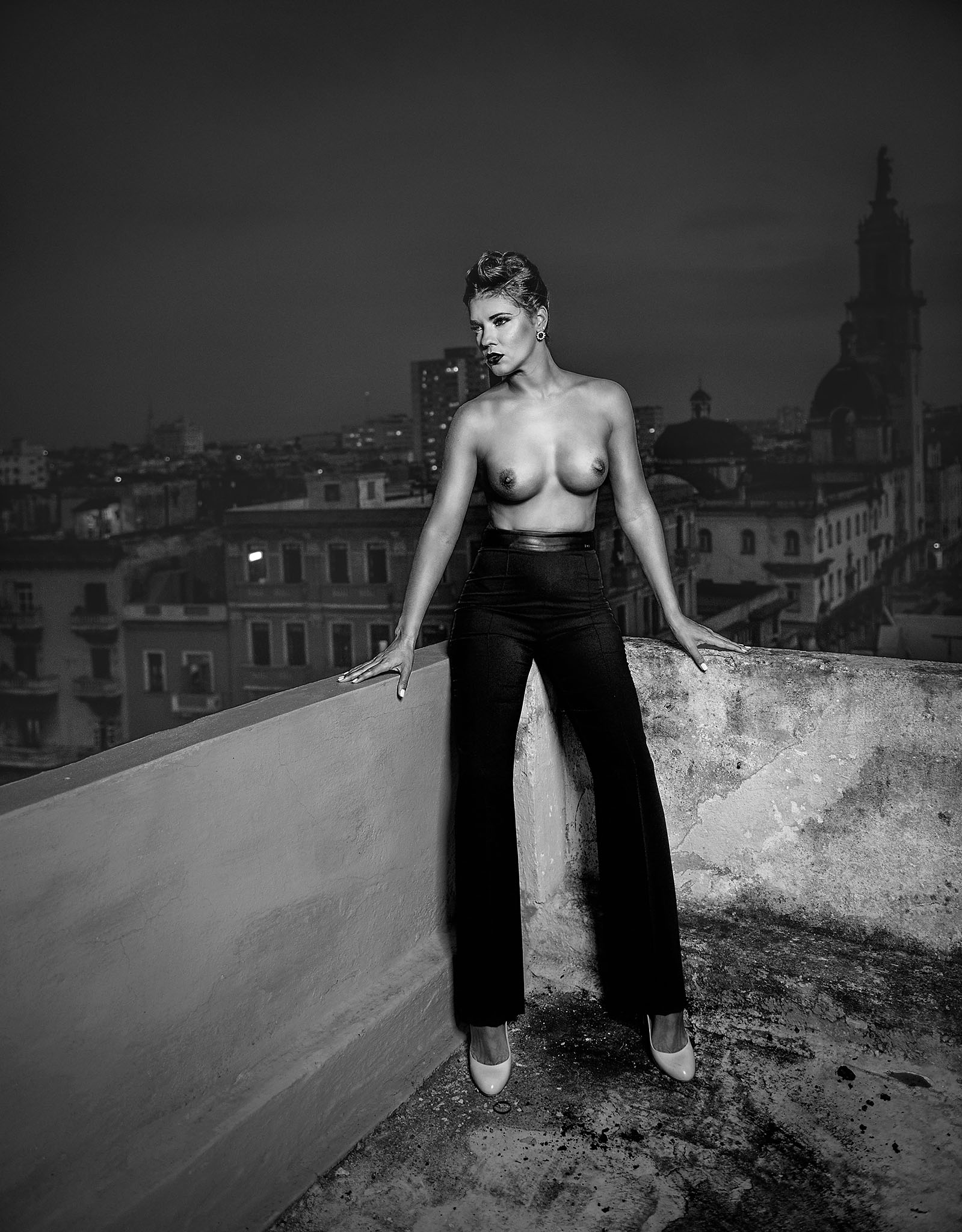 This one-of-a-kind photographic adventure offers a chance to explore sensuality and elegance through your lens. Led by Izuky Pérez, you’ll photograph Cuba’s most striking women—dancers, athletes, and artists—set against the enchanting and weathered backdrop of Havana. The city’s crumbling colonial buildings, pastel baroque charm, vibrant 1950s American cars, and rich Afro-Cuban culture combine to create one of the world’s most evocative settings for glamour and fine-art photography.

Beyond the architecture and atmosphere, you’ll be capturing the proud, radiant beauty of Cuban women—each one comfortable in her skin, exuding an effortless sensuality that speaks of confidence, heritage, and liberation. This tour is designed as an elegant tribute to the female form, as well as a respectful nod to how Cuban culture has empowered women to express themselves freely and with pride. 